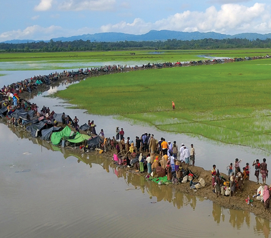 PALONGKHALI, UKHYA, COX S BAZAR, BANGLADESH- SEPTEMBER 08, 2017: Aerial view of Rohingya refujees are waiting to go camap  at Palongkhali, Cox s bazar Thousands of Rohingyas still crossing the border between Myanmar and Bangladesh after the Burmese army started an operation against the Rohingyas, by burning and destroying their home in the Rakhine state of Myanmar, as now more than 410,000 Rohingyas crossed the border and the United Nations expect the number rises to 1 million by the end of the year 